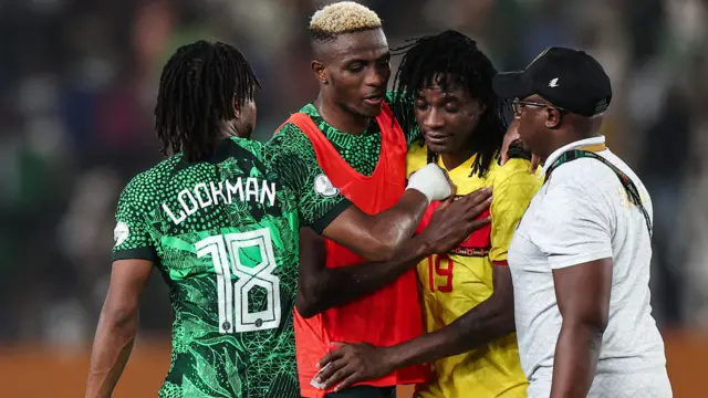 Nigeria players console Mabululu