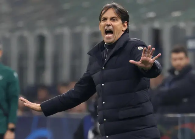 Inzaghi screams and gestures on the sideline.