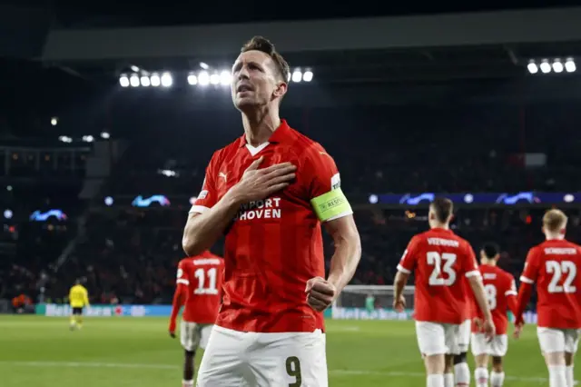 Luuk de Jong fist pumps in the air to celebrate scoring the equaliser.