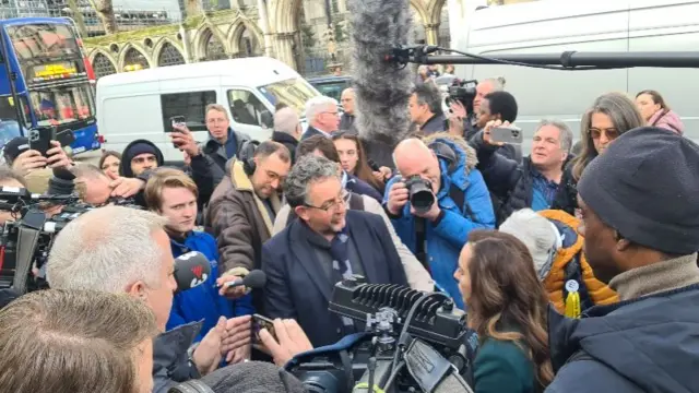 Stella Assange interviewed by the BBC's Dominic Casciani outside the High Court in London