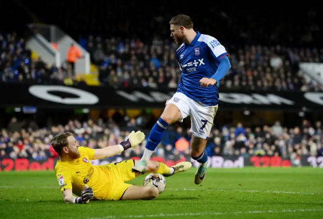 Rotherham's Viktor Johansson saves from Ipswich's Wes Burns