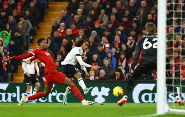 Tahith Chong fires in a shot as Kelleher prepares to save it