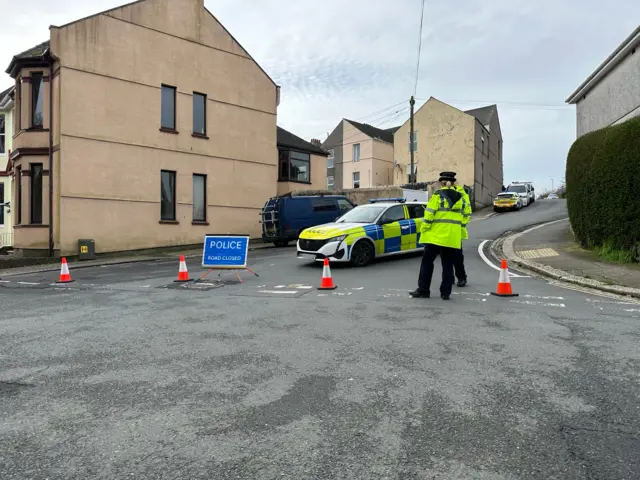 Police officers at cordon