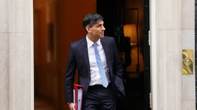 Rishi Sunak leaving No 10 Downing Street