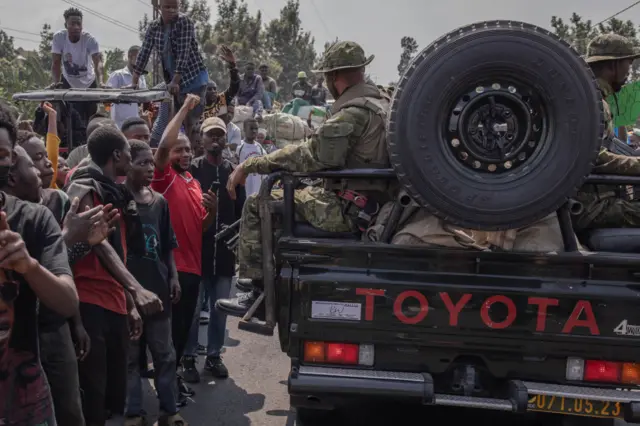 Demonstrators gather to denounce the international community's silence in the face of the perpetual crisis in the East of the Democratic Republic of Congo, and to show their support for the Congolese army and the pro-government militia Wazalendo, in Goma, on February 19, 2024