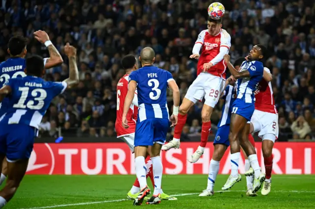 Havertz wins the ball in the box above several Porto defenders.