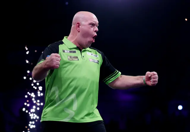 Michael van Gerwen celebrates beating Luke Littler