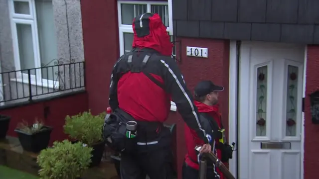 Dartmoor Search and Rescue Group members door knocking