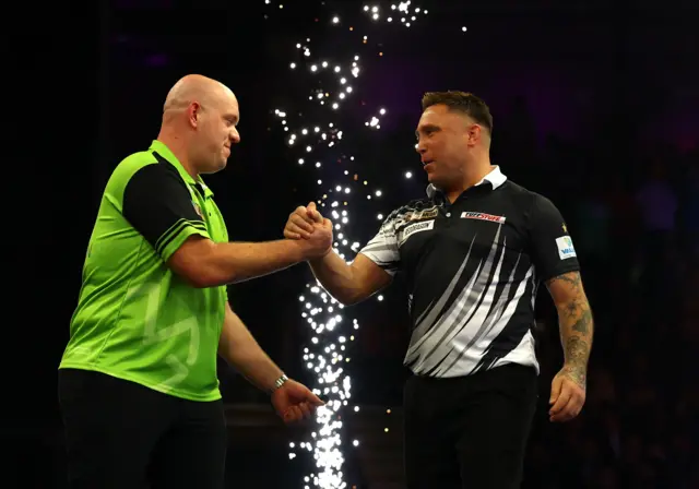 Michael van Gerwen and Gerwyn Price after their Premier League Darts quarter-final in Newcastle