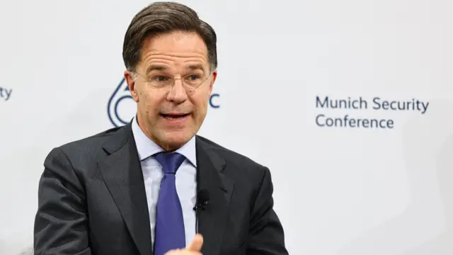 Mark Rutte gestures as he speaks during a panel discussion