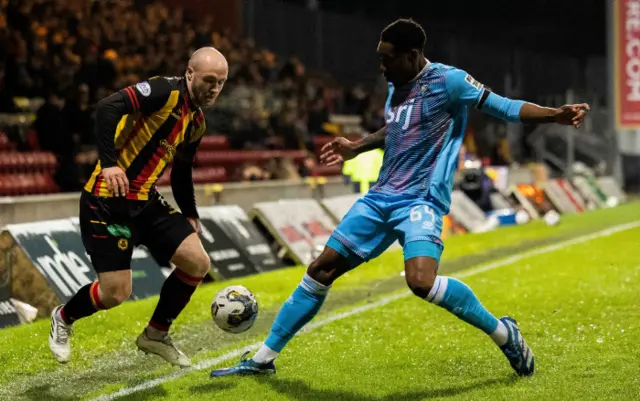 Partick's Kerr McInroy (L) and Dunfermline's Malachi Fegan-Walcott in action during a cinch Championship match between Partick Thistle and Dunfermline at the Wyre Stadium at Firhill, on February 23, 2024, in Glasgow, Scotland.