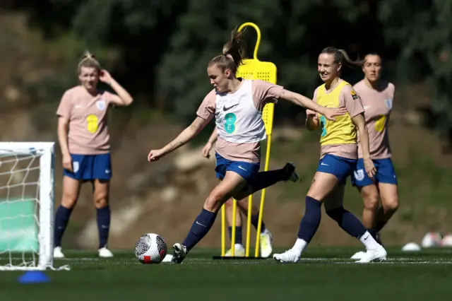 Georgia Stanway shoots at goal during a training exercise.