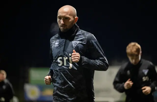 Dunfermline's Chris Kane warming up before a cinch Championship match between Partick Thistle and Dunfermline at the Wyre Stadium at Firhill, on February 23, 2024, in Glasgow, Scotland.