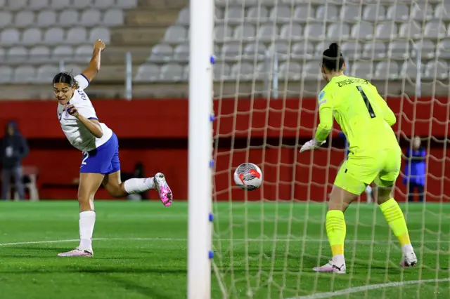 Carter flicks the ball into the net for England's fifth.