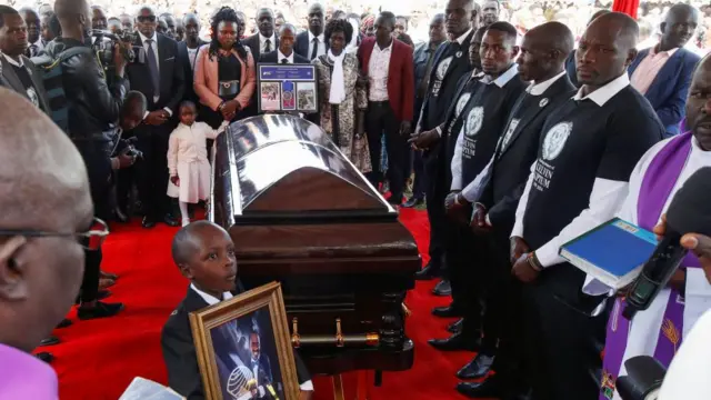 Family members surround the coffin of Kenya's marathon world record holder Kelvin Kiptum, who died in a road accident, during the funeral service at Chepkorio show ground, Elgeyo Marakwet County, Kenya February 23, 2024