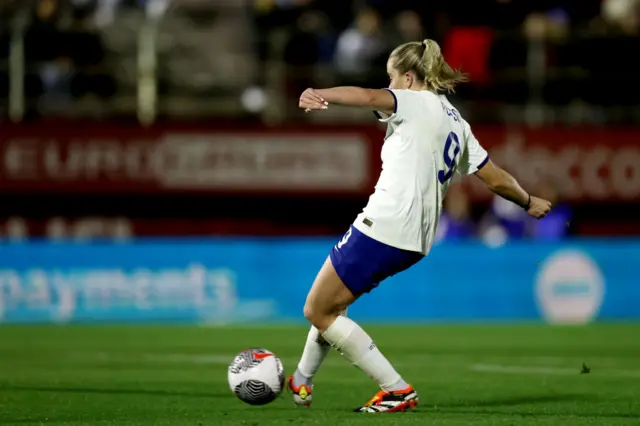 Alessia Russo slides in her second goal of the game.