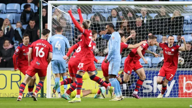 Preston celebrate scoring