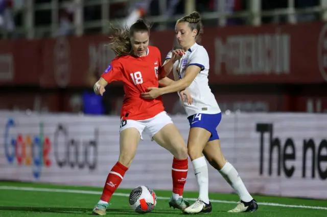 Ella Toone puts pressure on an Austria defender.