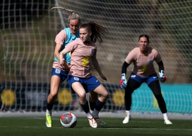 Park dribbles in england training session.