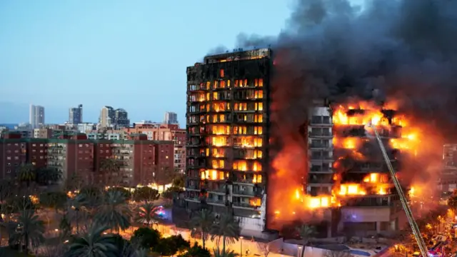 Image of fire engulfing an apartment block in Valencia, Spain.