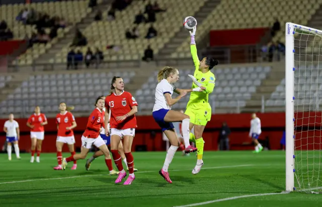 Zinsberger tips the ball over the bar under pressure.