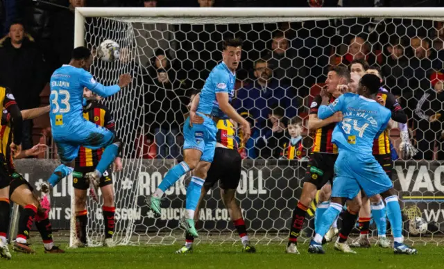 Dunfermline's Xavier Benjamin scores to make it 3-1 during a cinch Championship match between Partick Thistle and Dunfermline at the Wyre Stadium at Firhill, on February 23, 2024, in Glasgow, Scotland.