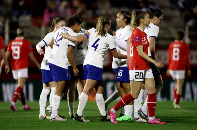 England players celebrate another goal as Austria players trudge back to kick off.