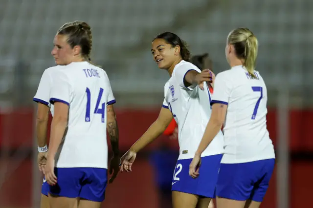 Carter is congratulated after scoring England's fifth.