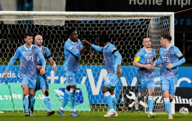 Dunfermline's Malachi Fegan-Walcott celebrates scoring to make it 1-1 eith his teammates during a cinch Championship match between Partick Thistle and Dunfermline at the Wyre Stadium at Firhill, on February 23, 2024, in Glasgow, Scotland.