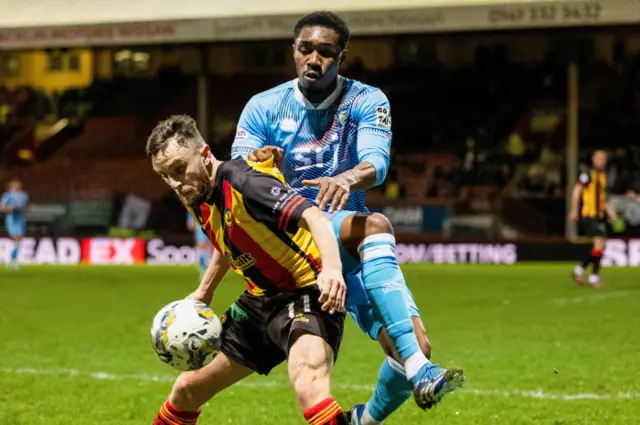 Partick's Steven Lawless (L) and Malachi Fegan-Walcott in action during a cinch Championship match between Partick Thistle and Dunfermline at the Wyre Stadium at Firhill, on February 23, 2024, in Glasgow, Scotland.