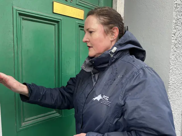 Devon and Cornwall Police and Crime Commissioner Alison Hernandez knocking on a door