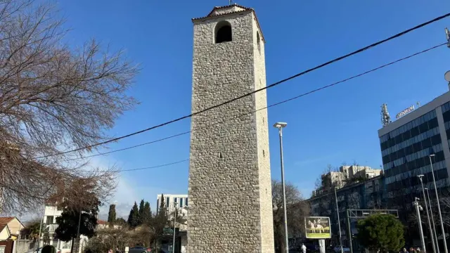 The 17th century clock tower survived heavy bombing in World War Two