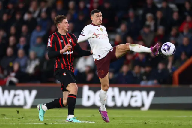 Phil Foden in action with Illya Zabarnyi