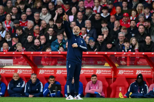 Nuno Espirito Santo, the head coach of Nottingham Forest, is gesturing