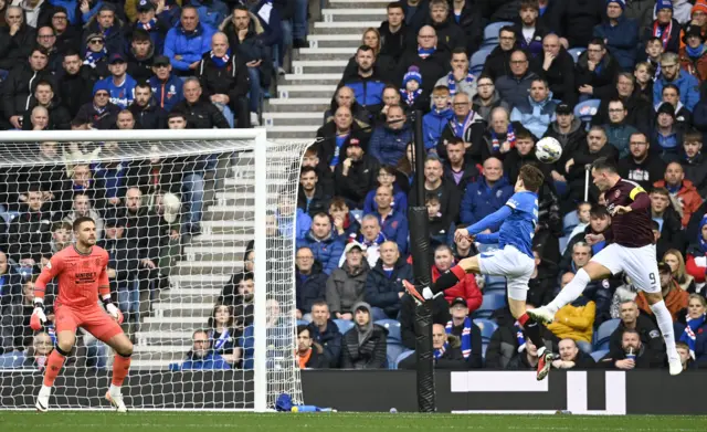 Lawrence Shankland scores for Hearts against Rangers in October