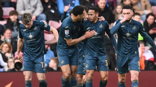 Swansea celebrate scoring