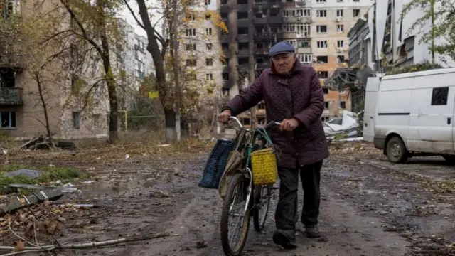 A man walks in Avdiivka