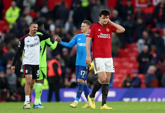 Harry Maguire of Manchester United looks dejected