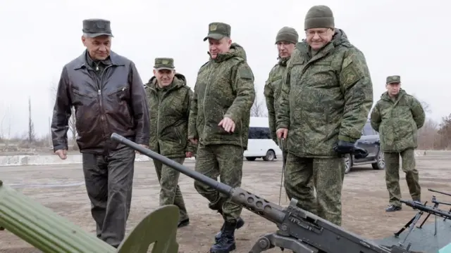 Russia's Defence Minister Sergei Shoigu inspects military equipment captured by Russian troops