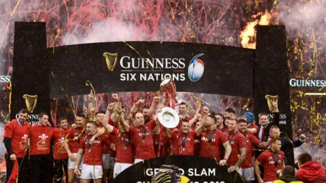 Wales winning the Six Nations Grand Slam, cheering with the trophy