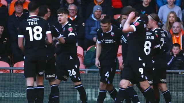 Bolton celebrate a goal at Blackpool