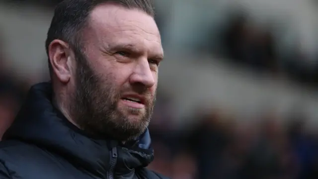 Ian Evatt watches from the touchline