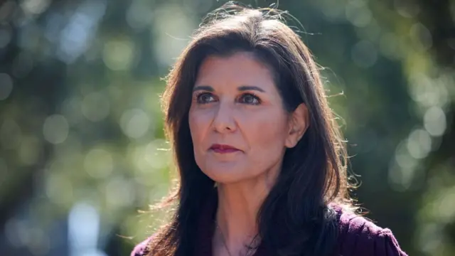 Republican presidential candidate and former U.S. Ambassador to the United Nations Nikki Haley looks on after casting her vote in the South Carolina Republican presidential primary election on Kiawah Island, South Carolina, U.S., February 24, 2024