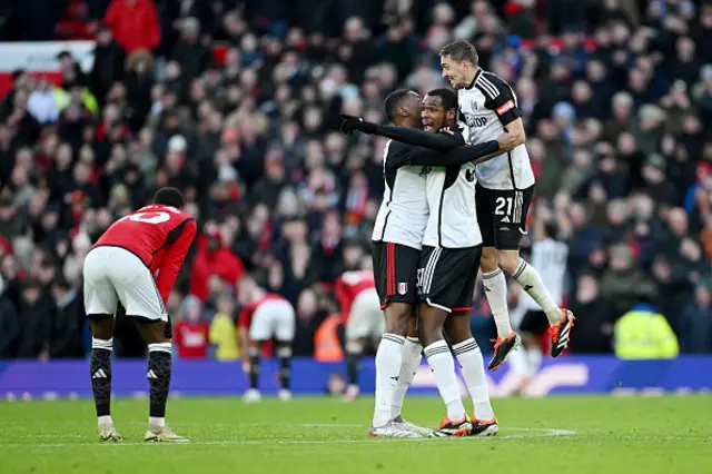 Issa Diop of Fulham and teammates celebrate after teammate Alex Iwobi (not pictured) scores