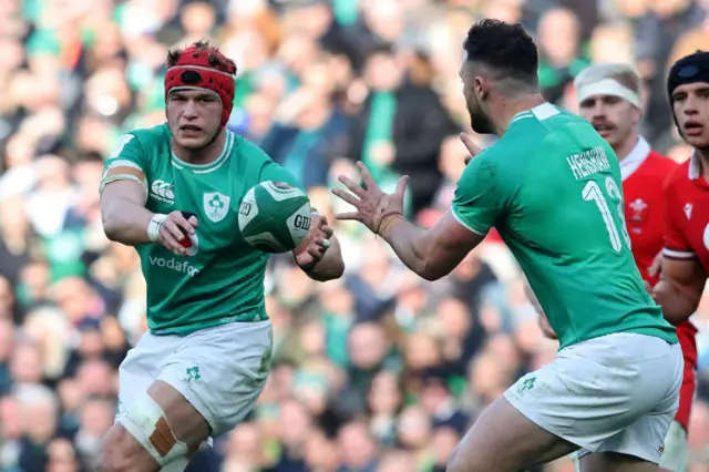 Henshaw throwing a ball