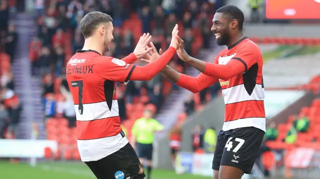 Doncaster celebrate a goal