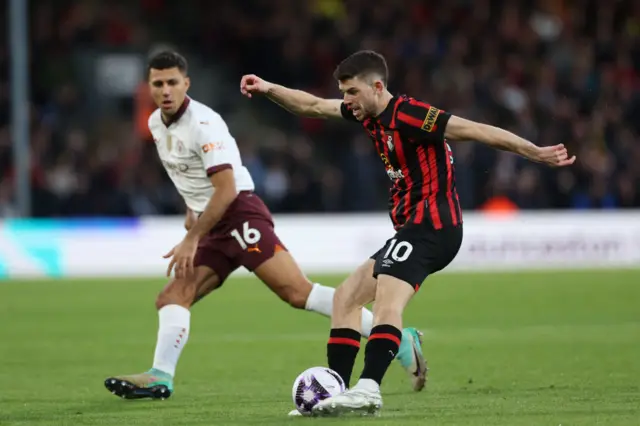 Ryan Christie crosses the ball