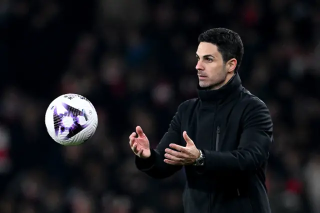 Mikel Arteta, Manager of Arsenal, throws the ball