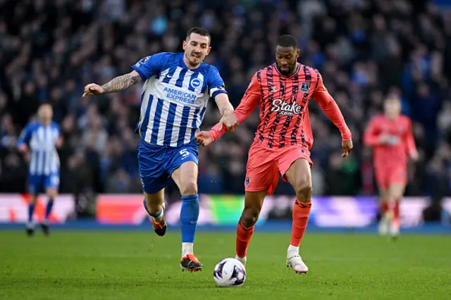 Lewis Dunk of Brighton & Hove Albion and Beto of Everton battle for possession