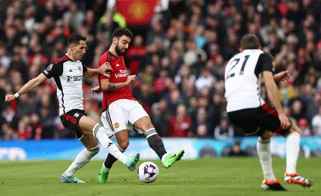 Sasa Lukic vies with Bruno Fernandes